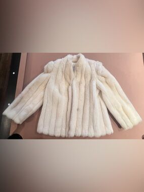 Intrigue Luxury Fabric Fur Coat Label